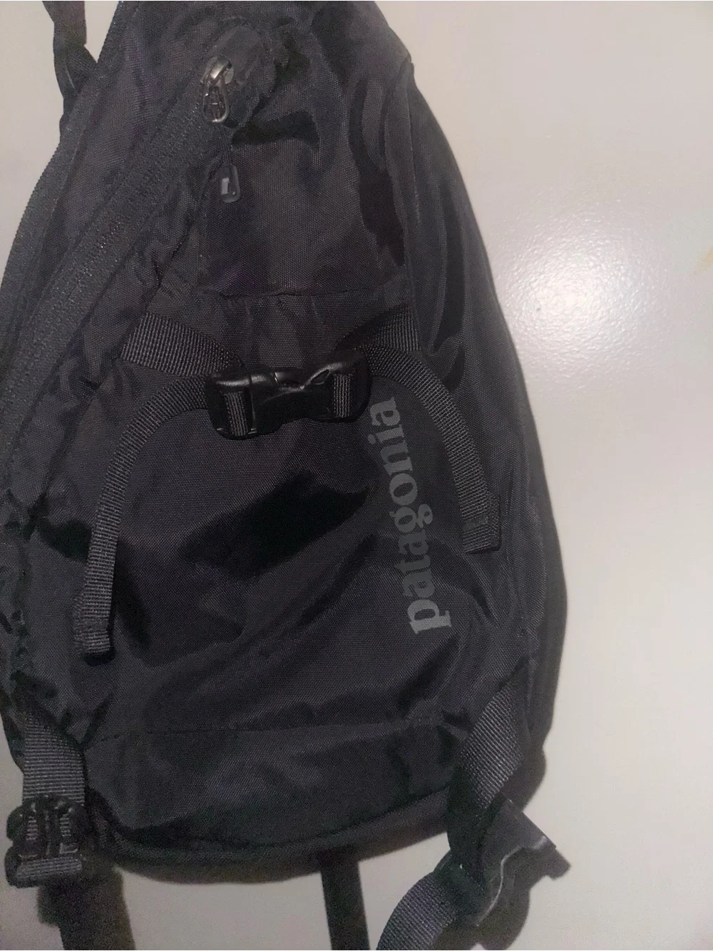 Patagonia Black Sling Pack with Front Buckle and Logo